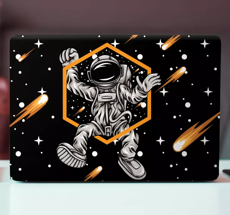 Laptop sticker astronaut in cosmic space - TenStickers