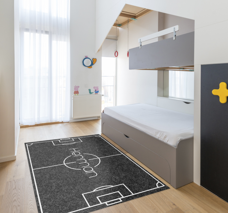 Football pitch with name game vinyl rug - TenStickers