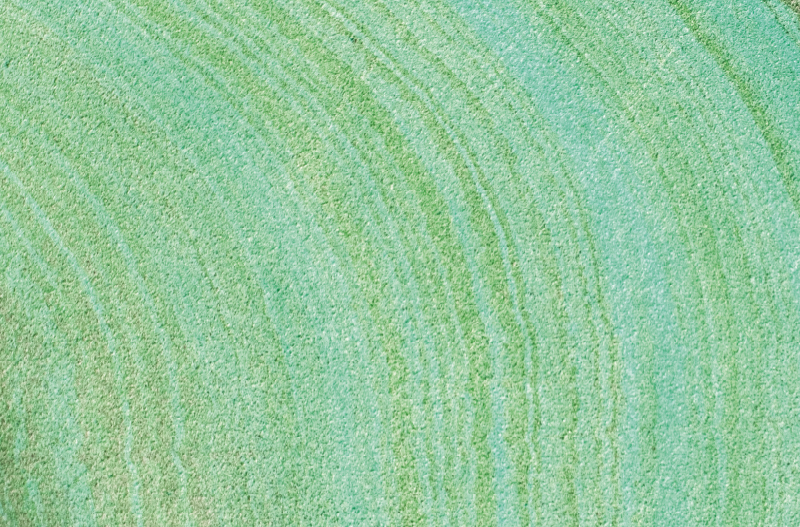 Swirling Green Shades textured vinyl rug - TenStickers
